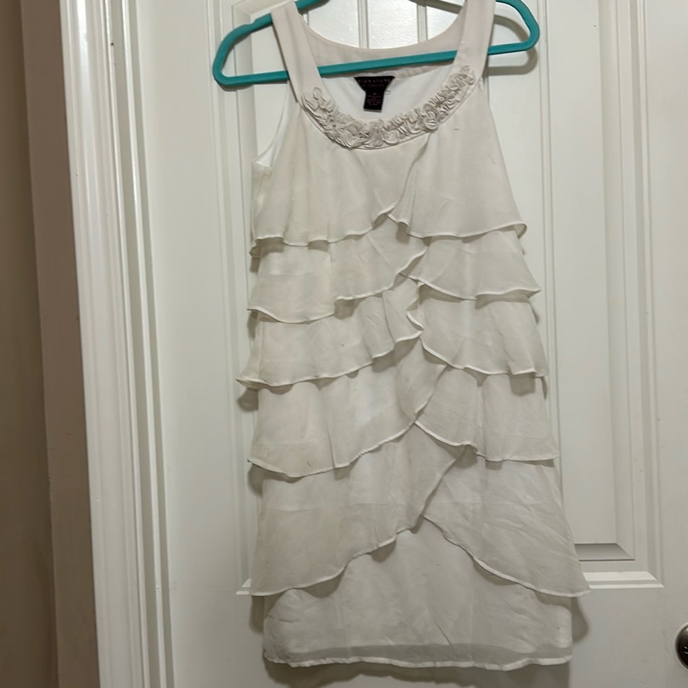 This is a wavy white dress. Size 8P. Used condition